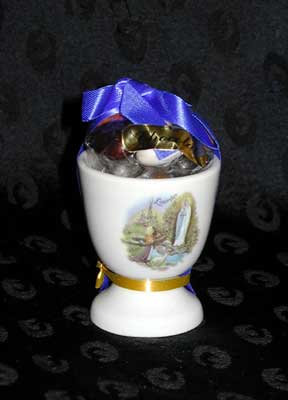 Egg cup filled with Special Lourdes Water Candies
